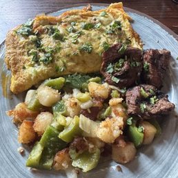 Omelette, steak, breakfast potatoes