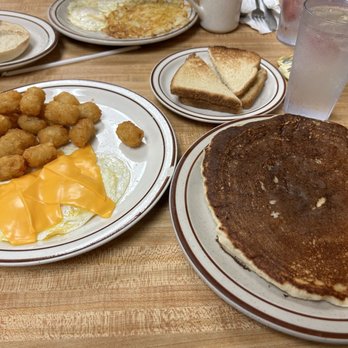 Taft Street Cafe - Tater tots eggs over med with cheese toast 1 pancake - Delis Near Me - Hollywood, Florida Taft Street Cafe - Tater tots eggs over med with cheese toast 1 pancake - Delis Near Me - Hollywood, Florida