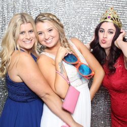 Capture Entertainment - Wedding guests posing with props in our open-air photo booth at a Southern California reception.