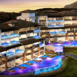 Cruise Planners - C. T. 'Russ' Russell - All-Inclusive Luxury Resorts