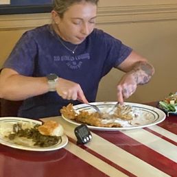 Katina of "Katina Eats Kilos" taking on the Chicken Fried Steak Challenge