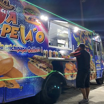 Aja Pelao - a man standing in front of a food truck - Food Trucks Near Me - Miami, Florida