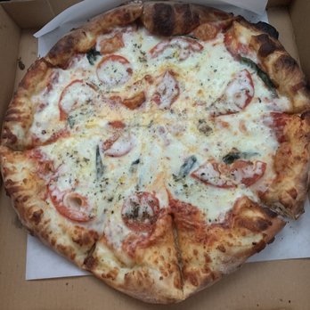 Drini Pizza - a pizza in a cardboard box - Pizza Near Me - West Columbia, Texas
