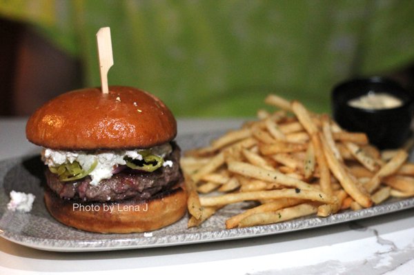 Photo of Sava's - Ann Arbor, MI, US. Greek Lamb Burger ($26) - house ground lamb, feta, salt roasted beet, pepperoncini, pickled red onion