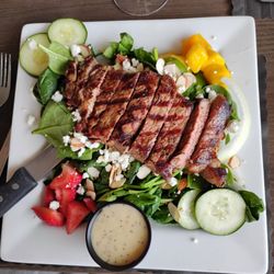 Lakeview Restaurant - Strawberry mango salad with famous Lakeview steak.