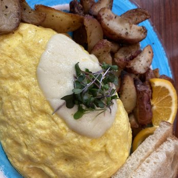 Clear Sky Cafe - Coastal Watch Omelette with home fries and toast. - New American Near Me - Clearwater, Florida