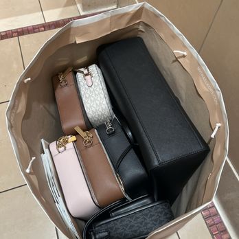 Michael Kors Outlet - ALL 7 BAGS were given to us in 1 bag like this. Other customers were getting their bags EACH NEATLY packed with tissue paper. - Women's Clothing Near Me - Commerce, California