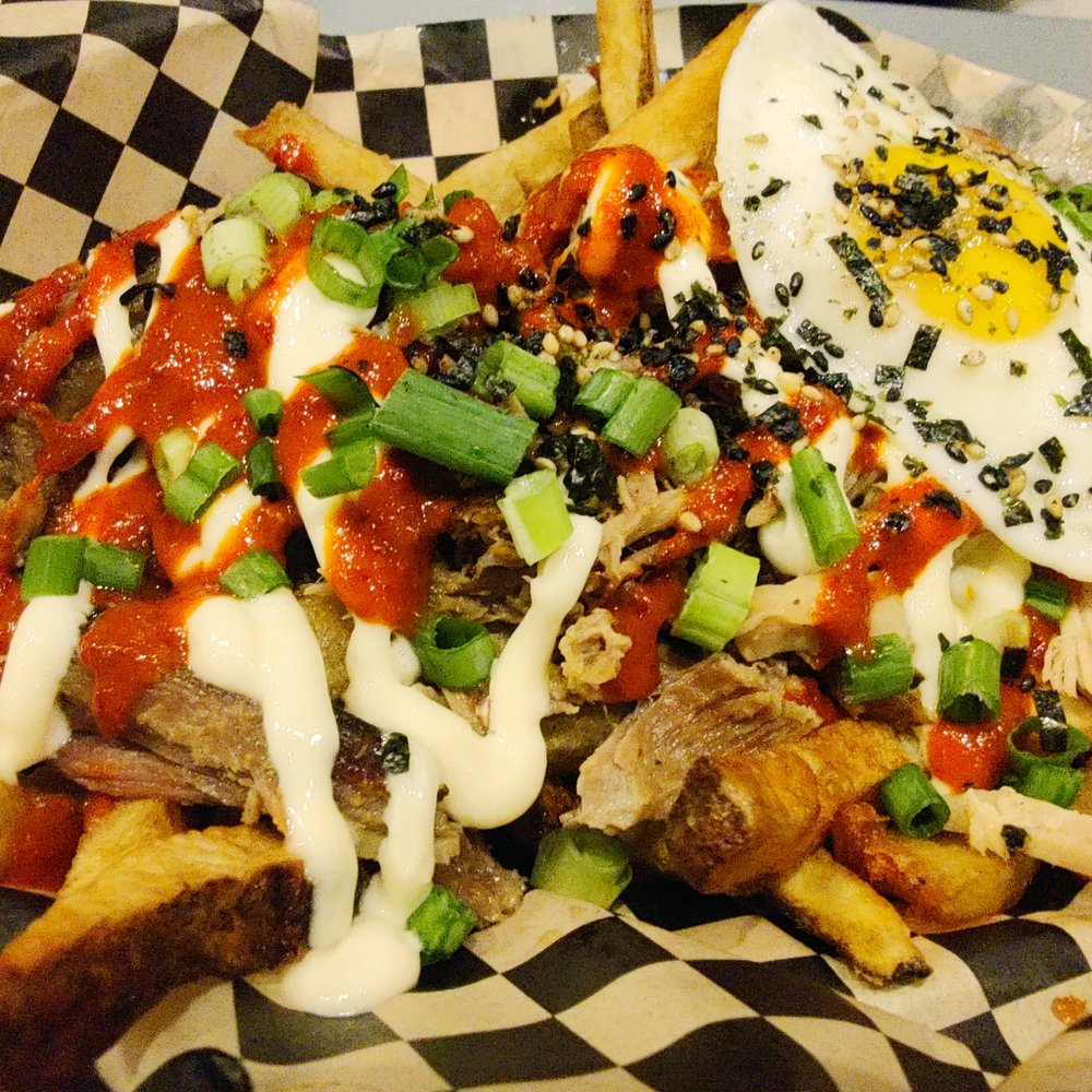 Marination Ma Kai - Aloha fries! Fries topped with mayo, kimchi sauce, kalua pork, and egg - Korean Near Me - Seattle, Washington Marination Ma Kai - Aloha fries! Fries topped with mayo, kimchi sauce, kalua pork, and egg - Korean Near Me - Seattle, Washington