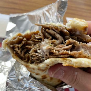 Gyroz Mediterranean Eatery - a hand holding a pita - Mediterranean Near Me - Lexington, Kentucky