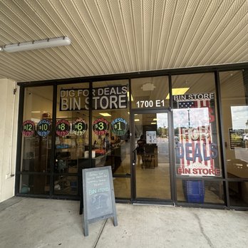 Dig for Deals Bin - the entrance, displaying what deals they have each day of the week. - Discount Store Near Me - Port Charlotte, Florida