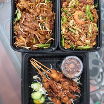Borneo Eatery - Kwe Tiau Goreng(L) Kalimantan and nasi goreng kalimantan fried rice (R) and chicken satay w/ peanut sauce - Indonesian Near Me - Alhambra, California Borneo Eatery - Kwe Tiau Goreng(L) Kalimantan and nasi goreng kalimantan fried rice (R) and chicken satay w/ peanut sauce - Indonesian Near Me - Alhambra, California