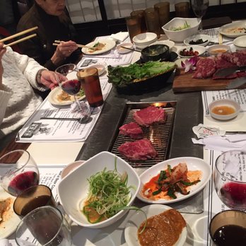 Keum Ho Garden - Yes, we were able to grill at our table after all. The charcoal grill in this picture is for beef. - Sushi Bars Near Me - Edison, New Jersey