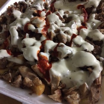 Lazeez - Mild Lazeez on the rocks with half rice and half fries - Mediterranean Near Me - Mississauga, Ontario