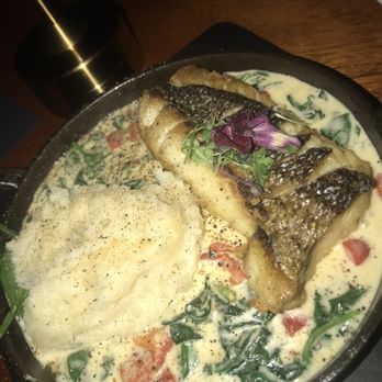 456 Fish - Fish in a spinach tomato cream sauce - Seafood Near Me - Norfolk, Virginia
