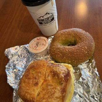 Elite Experience: Reno Tahoe Bagel Co. - Vanilla latte. sausage egg and cheese on jalapeño cheddar.   Pesto bagel with tomato cream cheese to go.   WOW - Yelp Events Near Me - Reno, Nevada