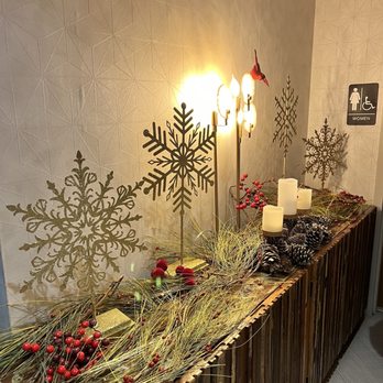 Sorellina's - a table with candles and christmas decorations - Italian Near Me - Rochester, Minnesota