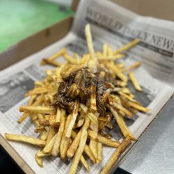 Bozeman Market & Deli - The kids had the Big Box, it's a poutine with Gravy, pork & cheese curds.