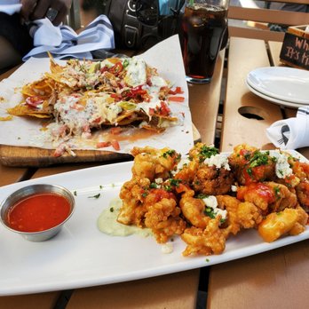 Finneys Crafthouse - Porter Ranch - Cauliflower buffalo wings and nachos. - New American Near Me - Porter Ranch, California
