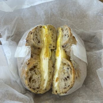 Bagelsaurus - classic jumbo on seeded wheat - Bagels Near Me - Cambridge, Massachusetts
