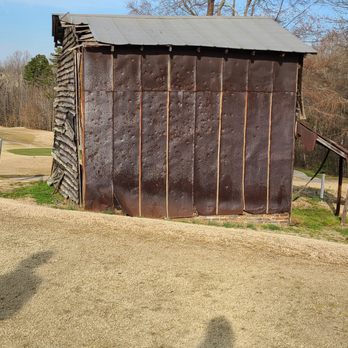 Winding Creek Golf Course - This old structure should not be in play off the tee, but as you can see from the pock marks, it is. - Golf Near Me - Thomasville, North Carolina Winding Creek Golf Course - This old structure should not be in play off the tee, but as you can see from the pock marks, it is. - Golf Near Me - Thomasville, North Carolina