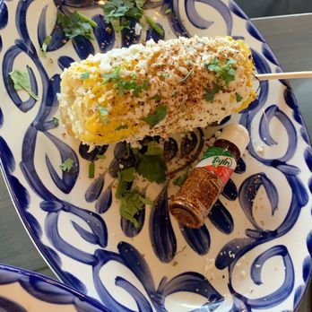 Ambriza - Street corn with complementary tajin seasoning .. delicious ! - Mexican Near Me - Cypress, Texas Ambriza - Street corn with complementary tajin seasoning .. delicious ! - Mexican Near Me - Cypress, Texas