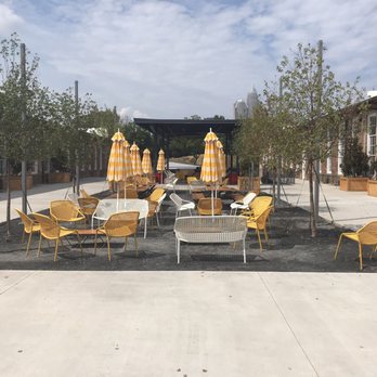 Optimist Hall - Front patio, lots of cute seating - Food Court Near Me - Charlotte, North Carolina Optimist Hall - Front patio, lots of cute seating - Food Court Near Me - Charlotte, North Carolina