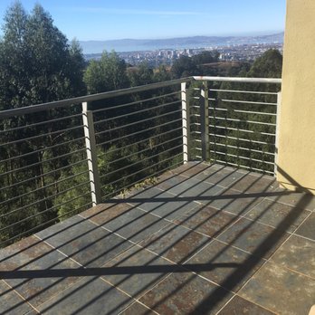 Karl Kardel Consultancy - a balcony with a view of the city - General Contractors Near Me - Piedmont, California
