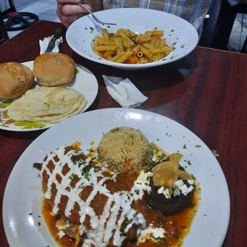 Basto's Grill - the chili rellenos is the fullest plate with rice and beans; excellent, the bowl is Napolitano Pasta with fresh tomatoes and basil - Bars Near Me - Isla Mujeres, ROO Basto's Grill - the chili rellenos is the fullest plate with rice and beans; excellent, the bowl is Napolitano Pasta with fresh tomatoes and basil - Bars Near Me - Isla Mujeres, ROO