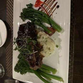 Hideaway Steakhouse - Braised wagu short rib with mashed potatoes and broccolini. Deelish! - Steakhouses Near Me - Westminster, Colorado Hideaway Steakhouse - Braised wagu short rib with mashed potatoes and broccolini. Deelish! - Steakhouses Near Me - Westminster, Colorado
