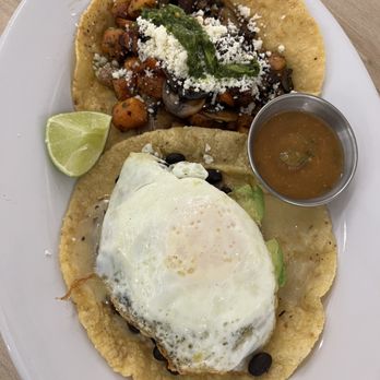 Boomtown Coffee - Mushroom & Sweet Potato Taco (top) and Seasonal Veggie Taco w/ Egg (bottom) - Cafes Near Me - Houston, Texas Boomtown Coffee - Mushroom & Sweet Potato Taco (top) and Seasonal Veggie Taco w/ Egg (bottom) - Cafes Near Me - Houston, Texas