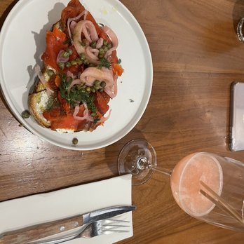 Mr West Cafe Bar Downtown - Salmon toast accompanied by a frosé. - Bars Near Me - Seattle, Washington