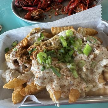 Sliders Oyster Bar - Crabby fries - Seafood Near Me - Neptune Beach, Florida Sliders Oyster Bar - Crabby fries - Seafood Near Me - Neptune Beach, Florida