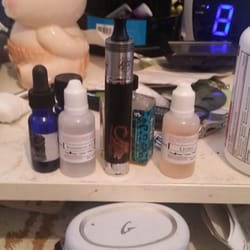 Delco Vapes - My new black copper stingray and my two flavors lychee and watermelon icey.