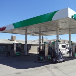 B K's Stop-N Shop - 2019-08-25 à 11h24 / Notre moto à l'ombre