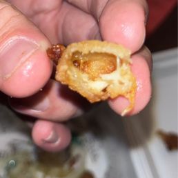 Cheese curd with no cheese. Cheese curd, more like bread curd.