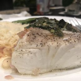Wild caught Alaskan halibut - poached in thai lemon mint sauce. Sooo tender and flaky Wild caught Alaskan halibut - poached in thai lemon mint sauce. Sooo tender and flaky