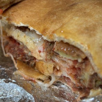 Louie & Ernie's Pizza - Eggplant calzone - Pizza Near Me - Bronx, New York