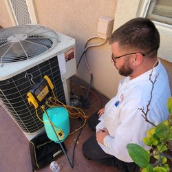 Of Course! Heating and Cooling - OfCourse Heating and Cooling Company located in Calimesa California  working on our air conditioning issues.