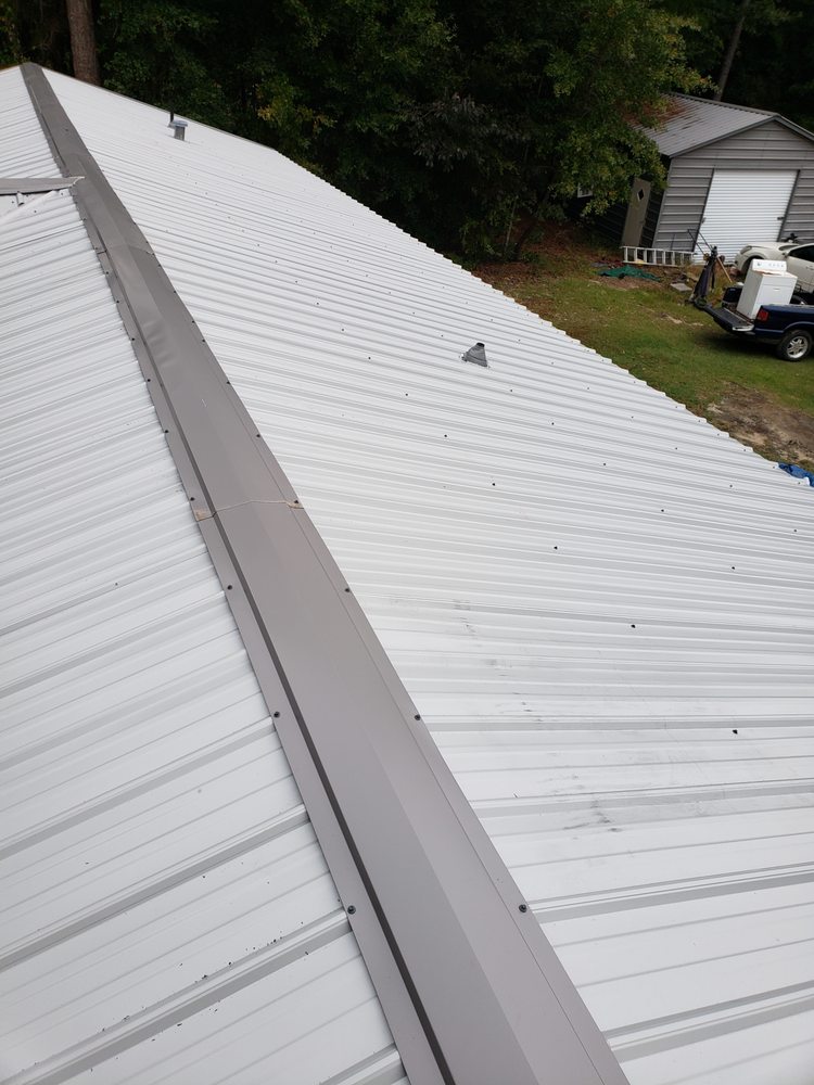 Slide of AR Roofing and Remodeling