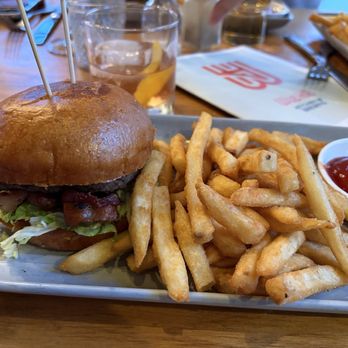 Wye Hill Kitchen & Brewing - WyeHill Burger  with fries - Breweries Near Me - Raleigh, North Carolina