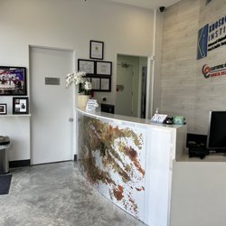 Khosroabadi Institute - View of the reception desk, and a photo of Dr. K on The Doctors TV show.