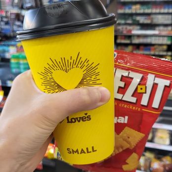 Love's Travel Stop - a hand holding a cup of coffee - Gas Stations Near Me - Prosser, Washington Love's Travel Stop - a hand holding a cup of coffee - Gas Stations Near Me - Prosser, Washington