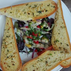 The Venue - Garlic bread with seasonal leaves