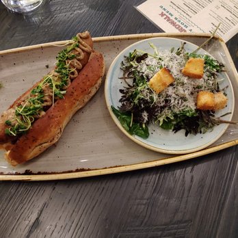 Boardwalk - Duck hotdog and Caesar salad - New American Near Me - Redmond, Washington