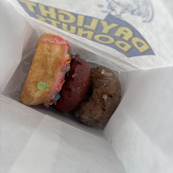 Daylight Donuts - Strawberry frosted with fruity pebbles, red velvet cake, blueberry cake - Donuts Near Me - Gainesville, Florida