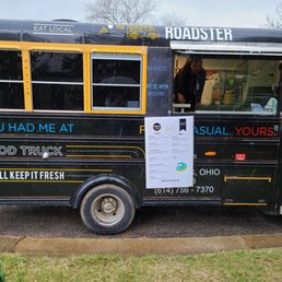 a black and yellow school bus