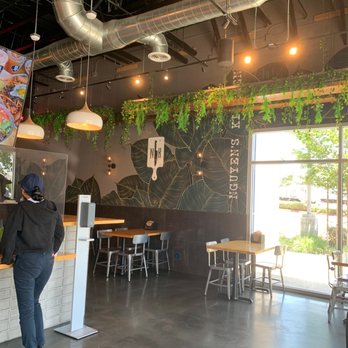Nguyen's Kitchen - Wall art, Seating, Hanging plants. - Vietnamese Near Me - South Gate, California