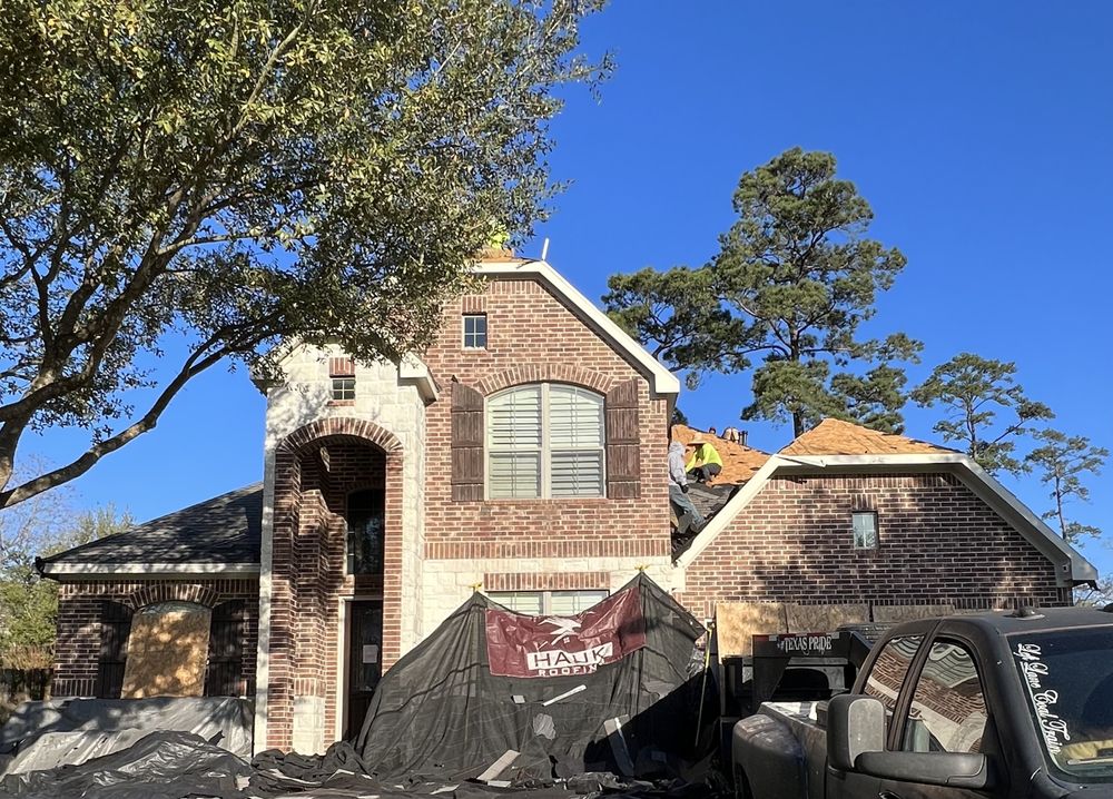 Slide of Hauk Roofing