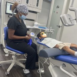 My son just chillin' watching Bluey while getting his teeth clean My son just chillin' watching Bluey while getting his teeth clean