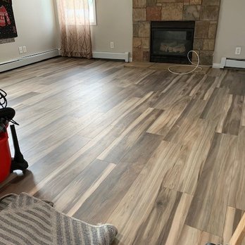 SG Elite Construction - a living room with hardwood floors - General Contractors Near Me - West Townsend, Massachusetts
